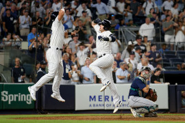 New York Yankees third baseman Josh Donaldson (28) celebrates his two run home run against the Seattle Mariners with right fielder Matt Carpenter (24) during the sixth inning at Yankee Stadium. Mandatory Credit: Brad Penner-USA TODAY Sports.