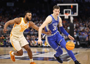 Duke Blue Devils center Kyle Filipowski (30) drives around Tennessee Volunteers guard Josiah-Jordan James (30) during the first half in the second round of the 2023 NCAA Tournament.