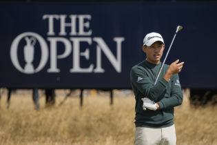 Collin Morikawa approaches the 15th green during a practice round for the 150th Open Championship golf tournament at St. Andrews Old Course. Mandatory Credit: Michael Madrid-USA TODAY Sports.