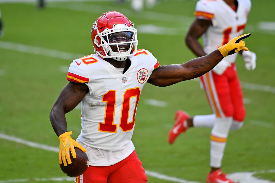 Tyreek Hill of the Miami Dolphins celebrates a touchdown catch