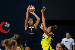 Las Vegas Aces center A'ja Wilson (22) attempts a three-point shot during game three of the 2020 WNBA Finals at IMG Academy. Mandatory Credit: Mary Holt-USA TODAY Sports.