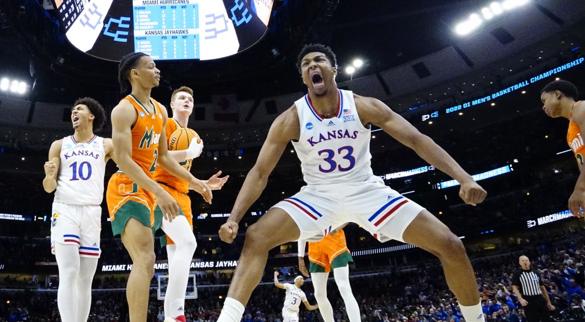 Kansas Jayhawks forward David McCormack (33) reacts after a play during the second half against the Miami Hurricanes in the finals of the Midwest regional of the men's college basketball NCAA Tournament at United Center. Mandatory Credit: David Banks-USA TODAY Sports.