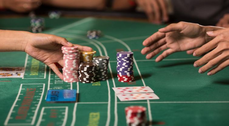 Player wins hand in Baccarat