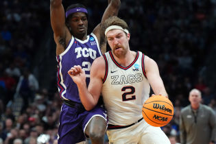 Gonzaga Bulldogs forward Drew Timme (2) controls the ball against TCU Horned Frogs forward Emanuel Miller (2) in the second half at Ball Arena.