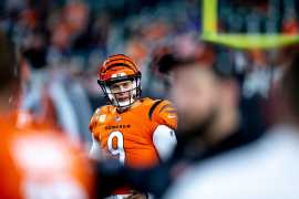 Bengals quarterback Joe Burrow (9) smiles while warming up before the NFL football game against the Jacksonville Jaguars on Sept. 30, 2021.