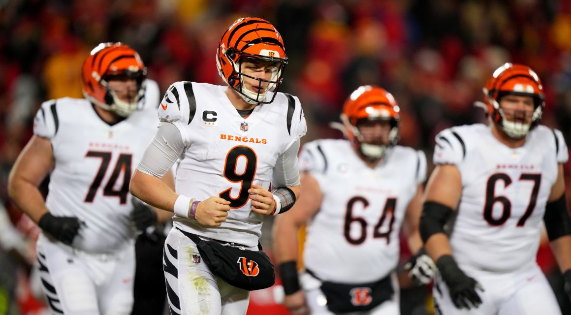 Cincinnati Bengals quarterback Joe Burrow (9) jogs off the field after a sack in the first quarter during the AFC championship NFL game between the Cincinnati Bengals and the Kansas City Chiefs.