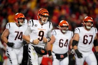 Cincinnati Bengals quarterback Joe Burrow (9) jogs off the field after a sack in the first quarter during the AFC championship NFL game between the Cincinnati Bengals and the Kansas City Chiefs.