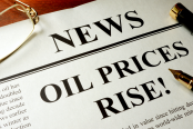 Newspaper with header news and Oil prices rise