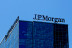 Sun shining on J.P. Morgan logotype on headquarters