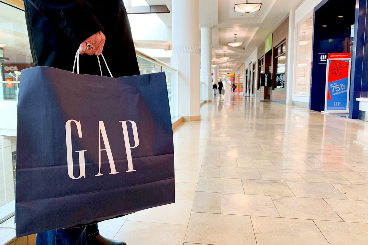 Consumer Holding Gap Shopping Bag
