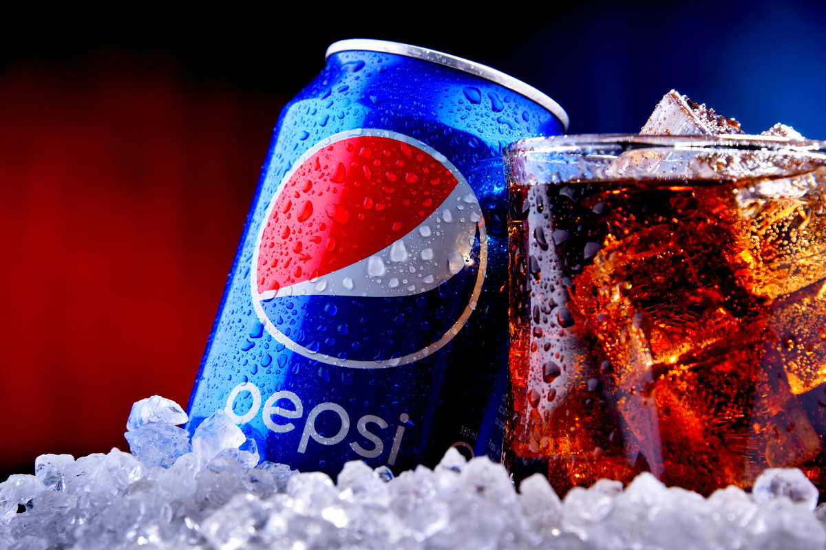 A can and a glass of Pepsi