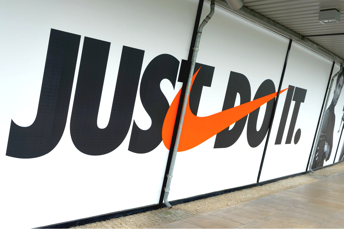 The Nike logo and Nike motto