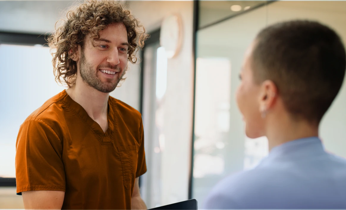 Patient speaking with dentist
