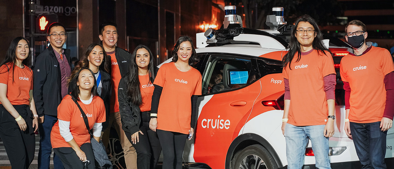 Members of Cruise's API community group pose with Poppy in the 2022 San Francisco Lunar New Year Parade