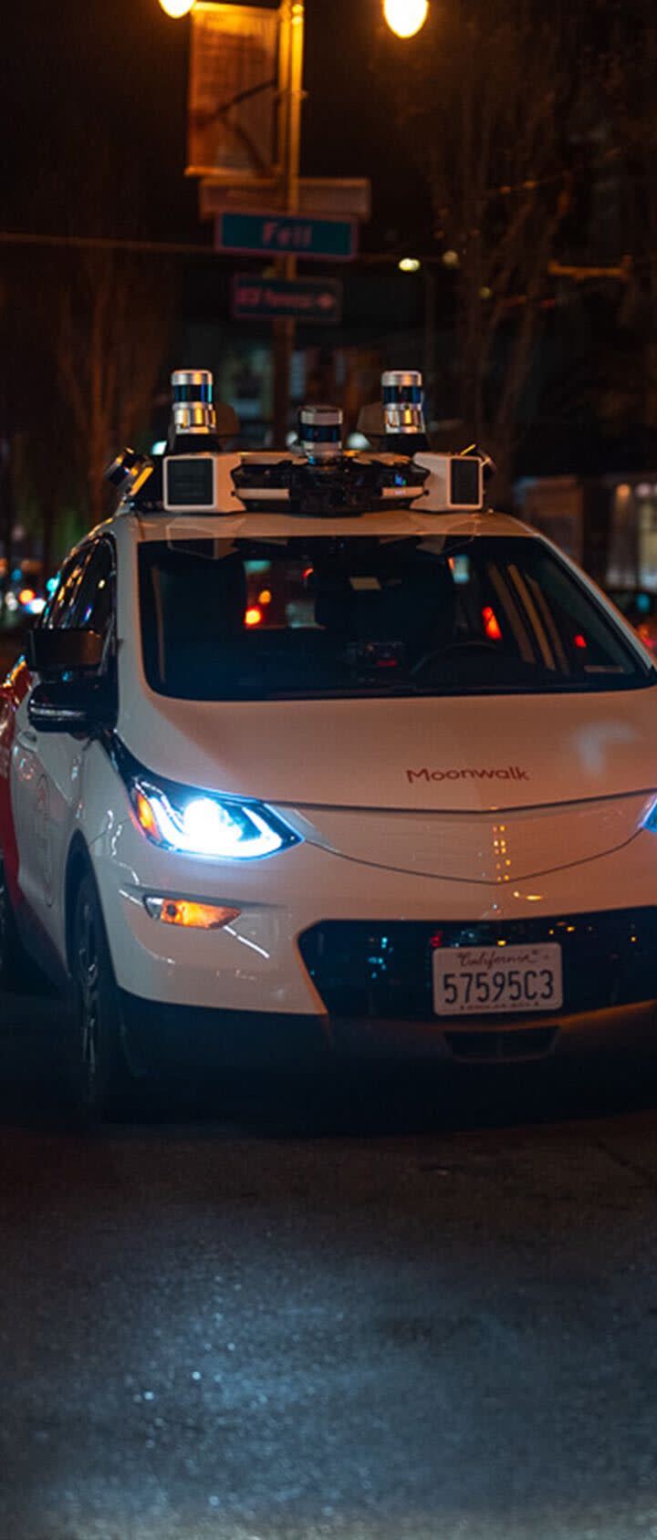 Cruise AV Disco drives through an intersection at night