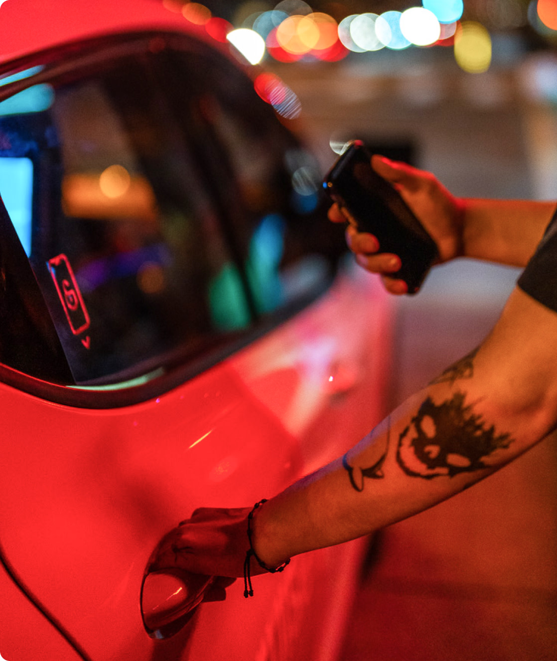 Rider entering self-driving vehicle at night