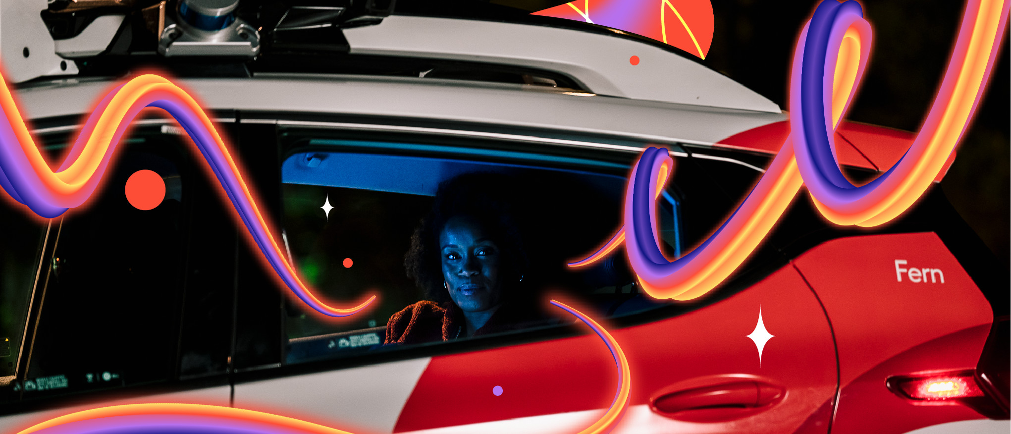 Woman in back of Cruise car with neon effects