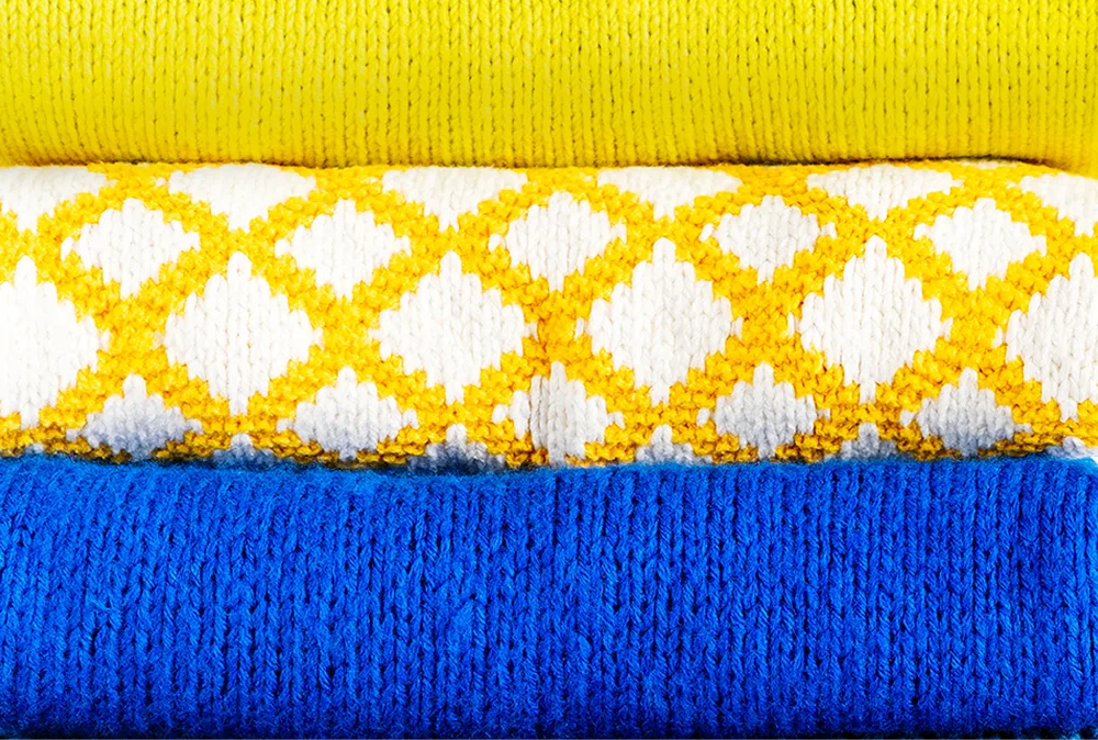 Una pila de ropa doblada por expertos