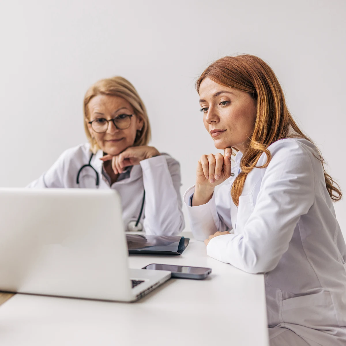 2 doctors at a table