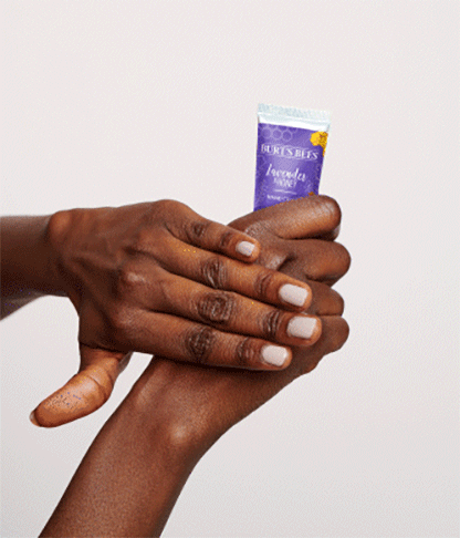 hands applying lavender & honey hand cream