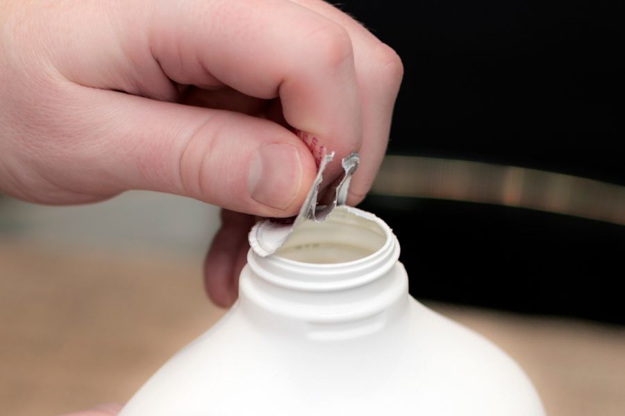 removing a seal liner on bottle