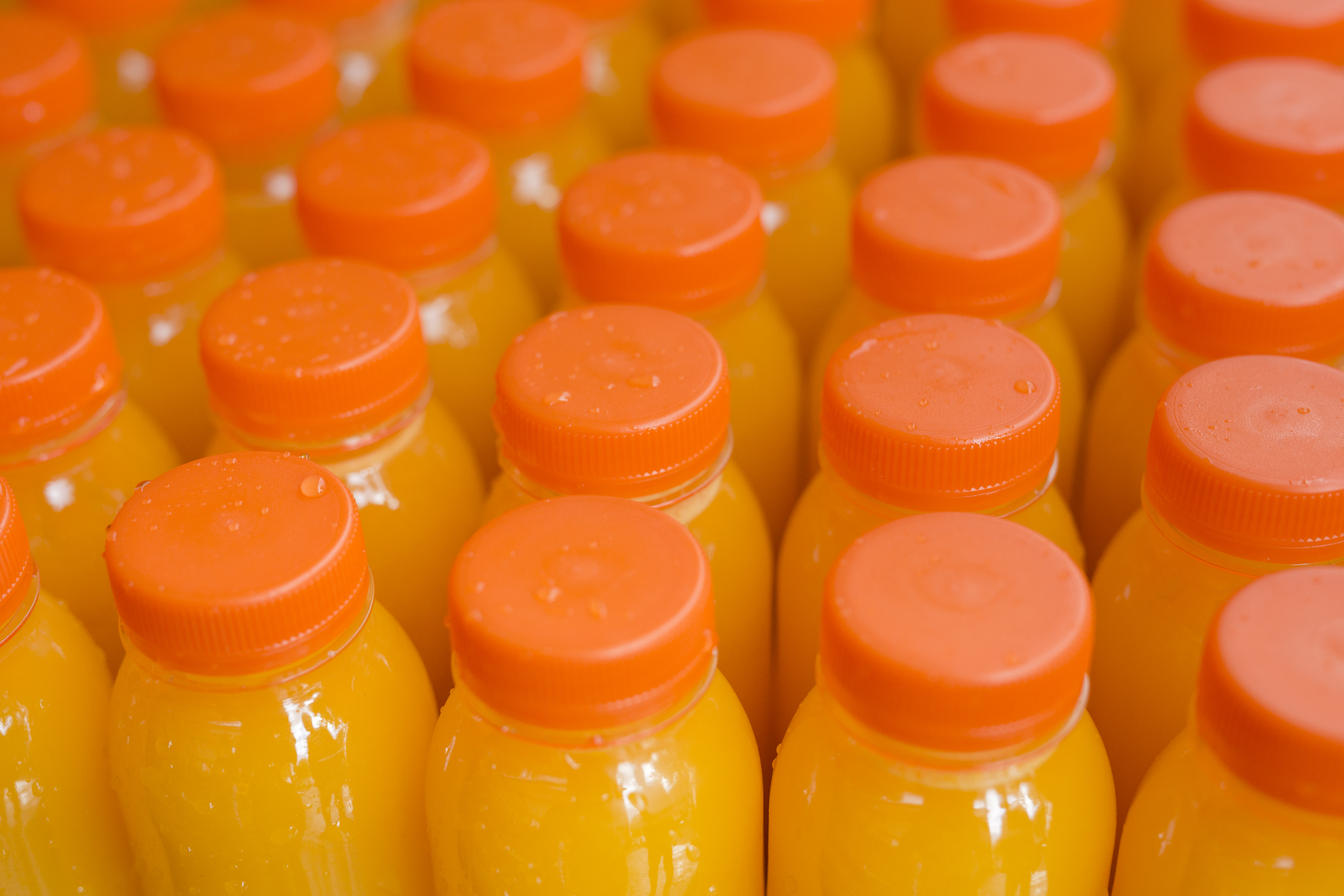 Bulk orange juice bottle packaging
