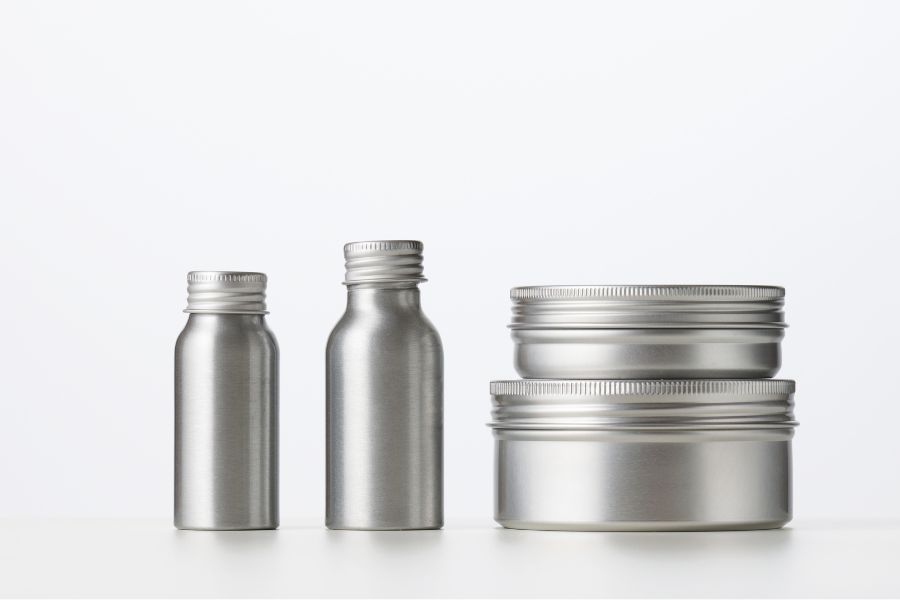 metal bottles and tins as types of packaging samples