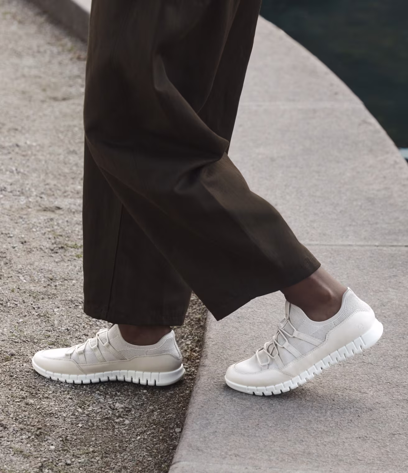 Step into innovative comfort with these cream slip-on trainers. Featuring elastic laces and a deeply grooved, flexible sole for a lightweight feel that moves naturally with you.