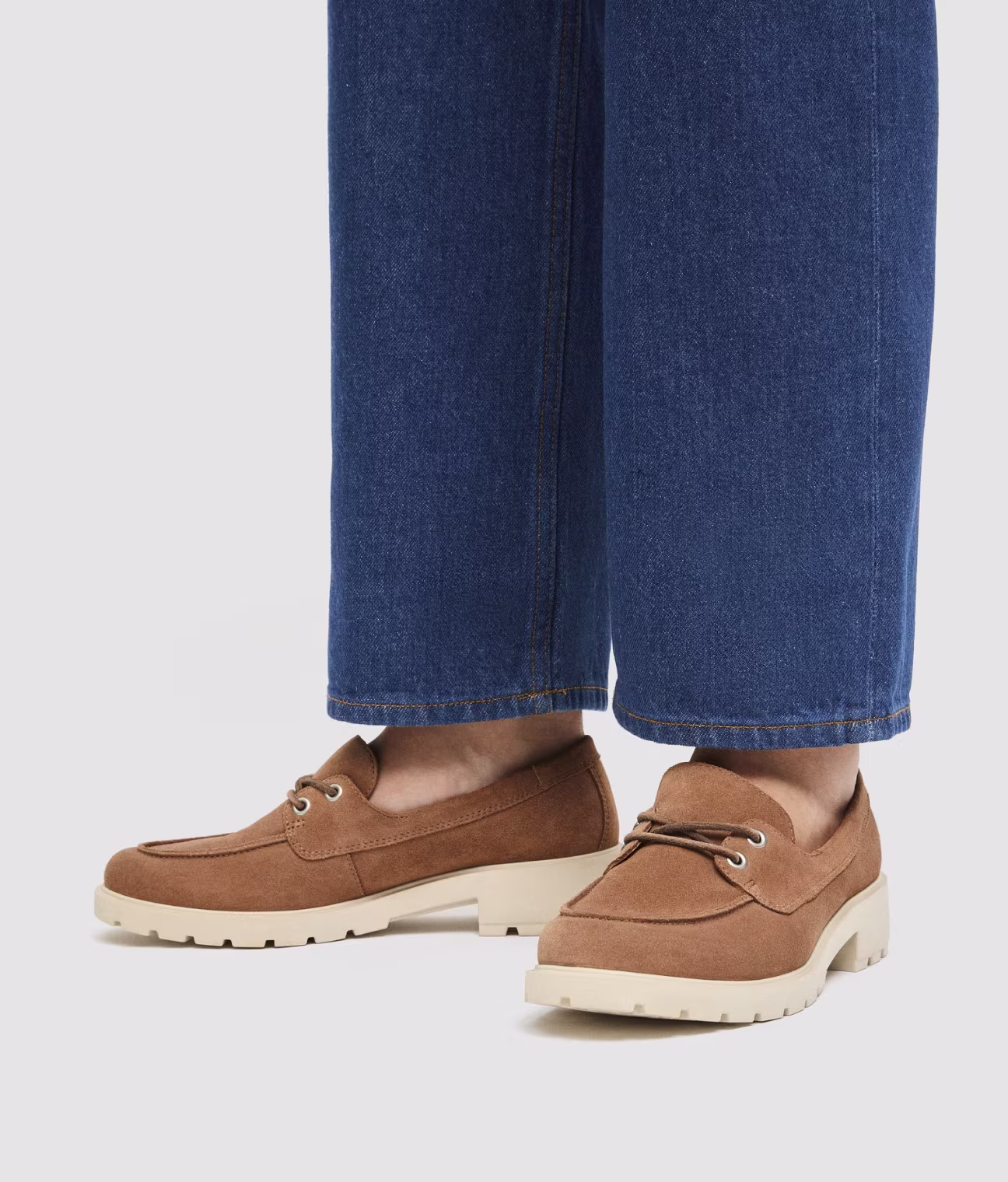 Break the mold with brown suede Ecco women's platform moccasins. They look great with jeans, adding character to casual outfits. Comfort and trends in one shoe. Step up your everyday look with this stylish and comfortable design.