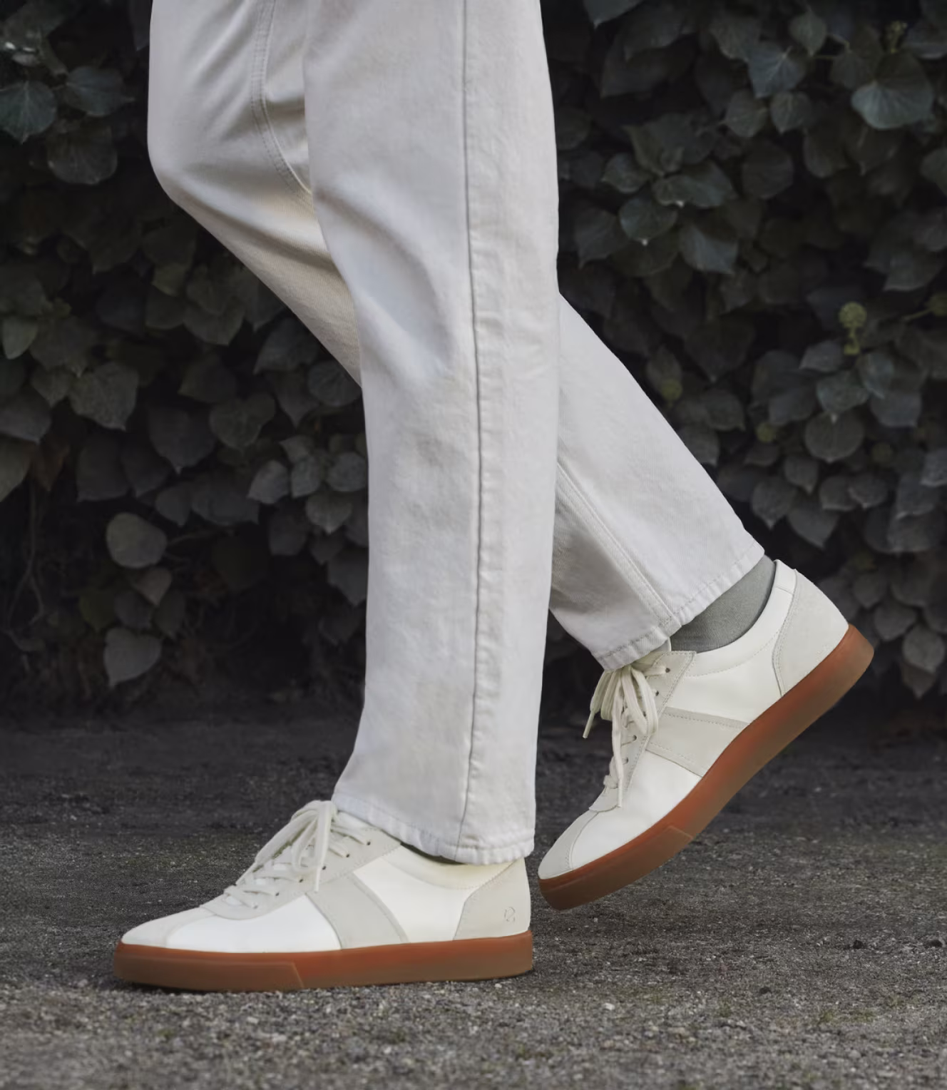 Discover understated elegance with these cream leather ECCO sneakers. The contrasting gum sole perfectly balances modern Scandinavian design with everyday wearability.