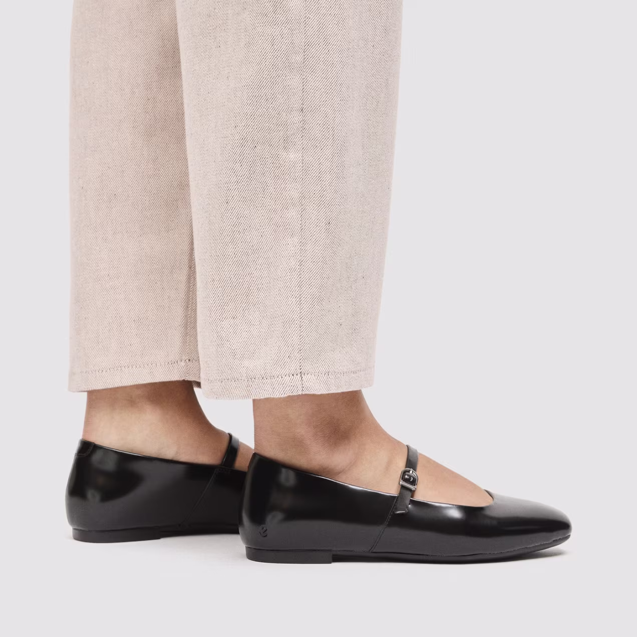 A timeless icon reimagined. These smooth black leather Mary Janes fuse classic Scandinavian minimalism with an anatomical fit for effortless transitions.
