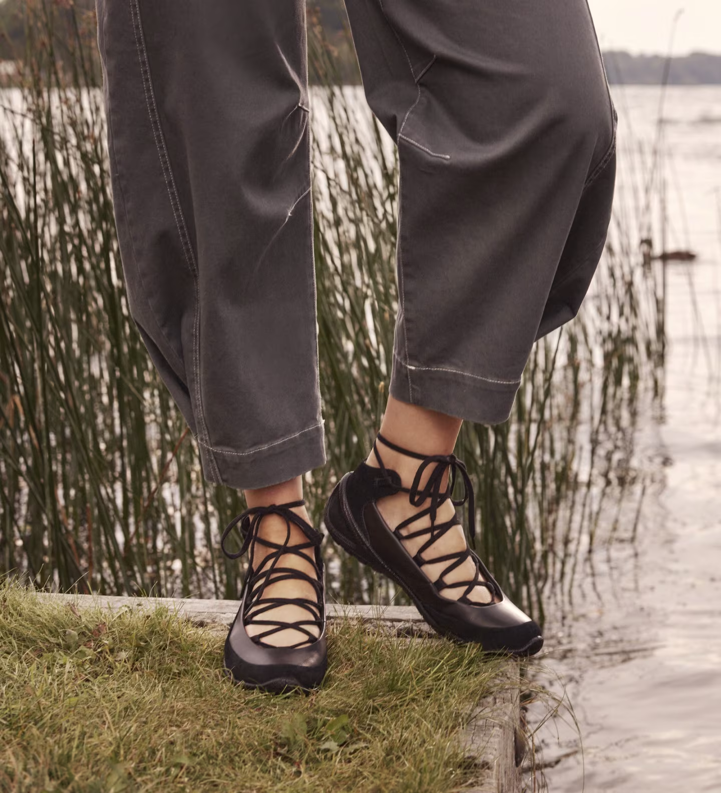 A striking balance of edge and elegance. These black leather lace-up flats feature a flexible sole and breathable feel, perfect for versatile styling.