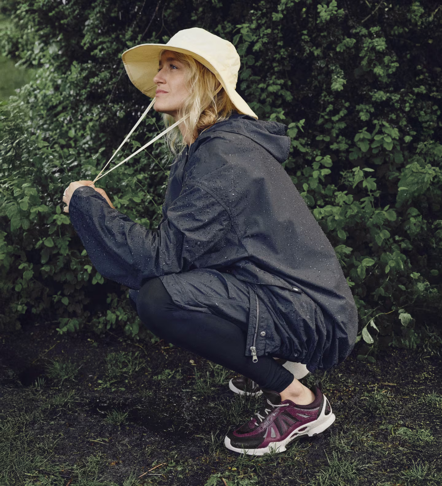 Plum-toned ECCO trail sneakers provide waterproof protection and robust traction, keeping your feet dry and cushioned through unpredictable weather in style.