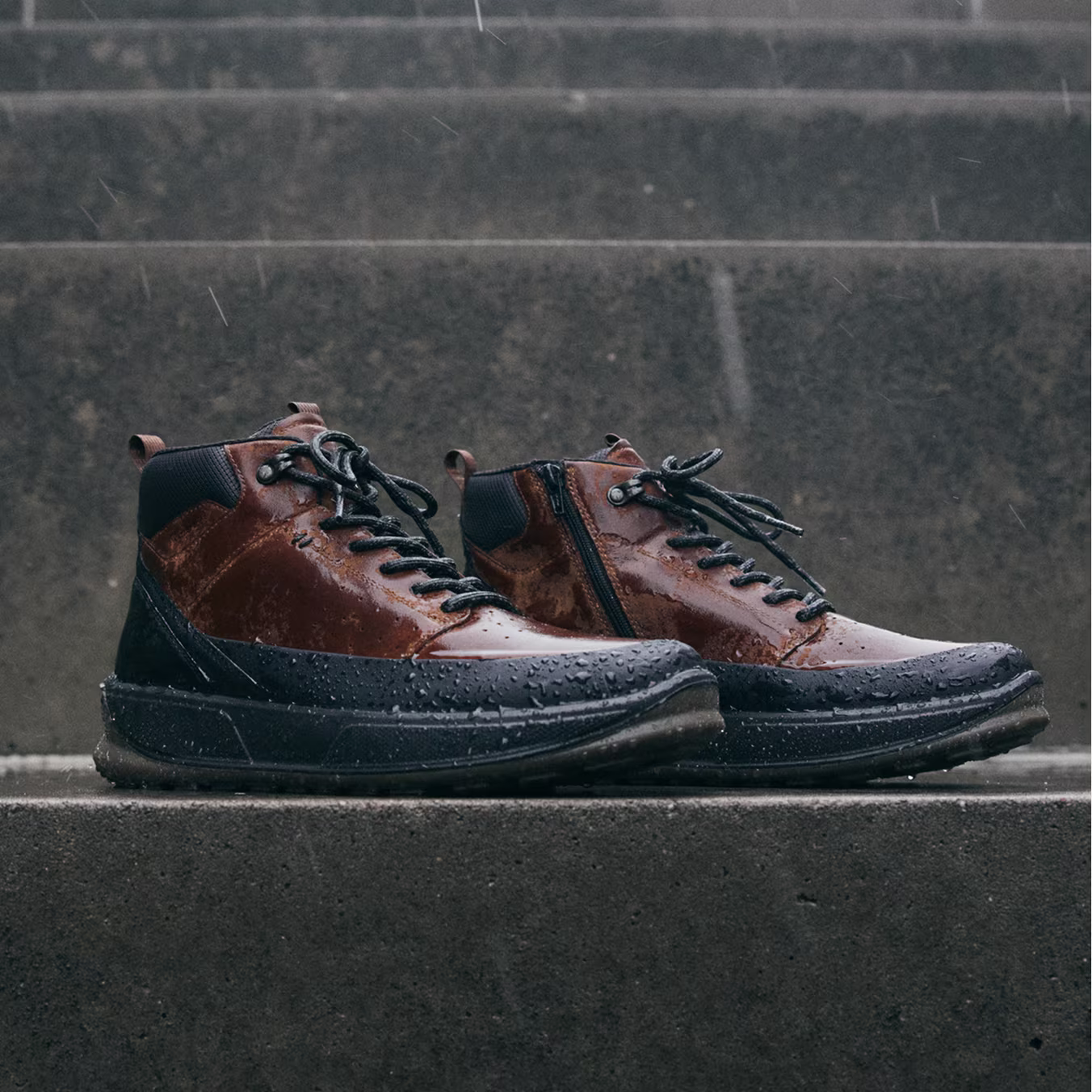 Brave wet conditions in ECCO brown leather boots, crafted with Scandinavian design to deliver waterproof protection and signature comfort.