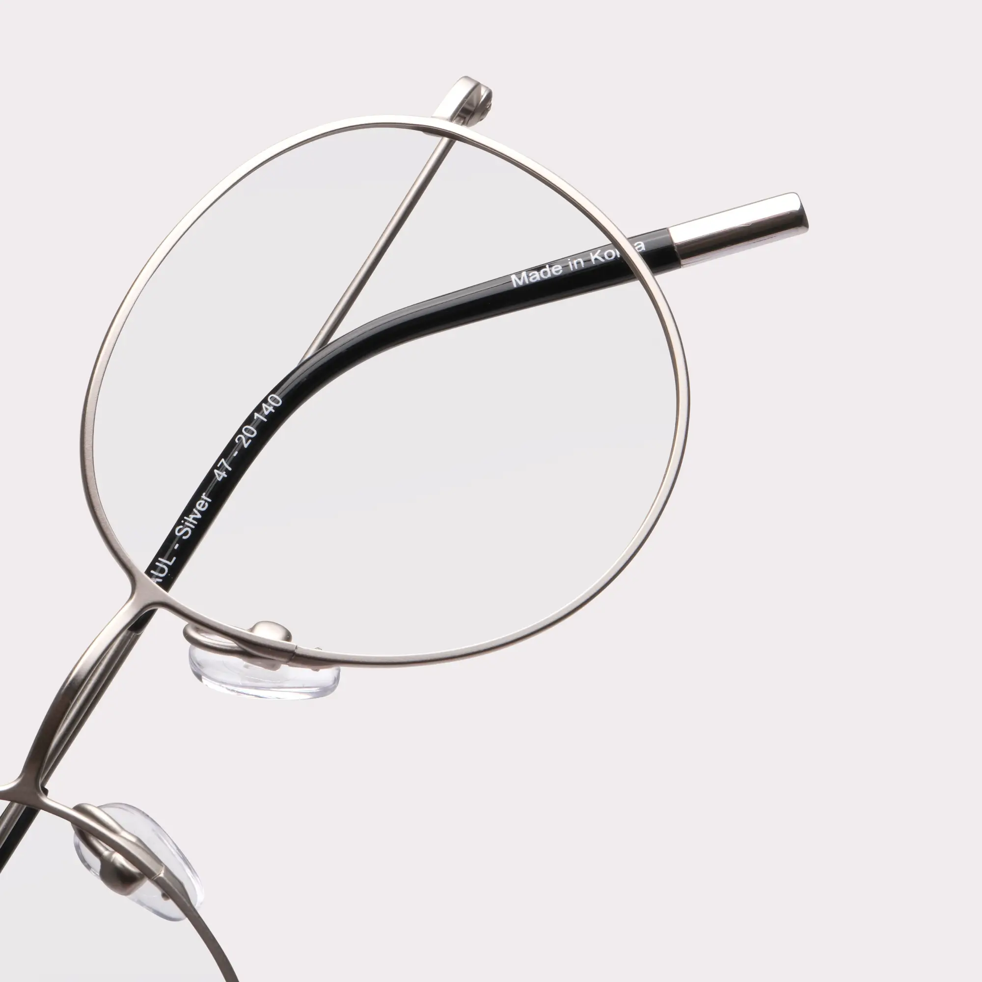 A pair of Saul Silver Prescription glasses in a macro view