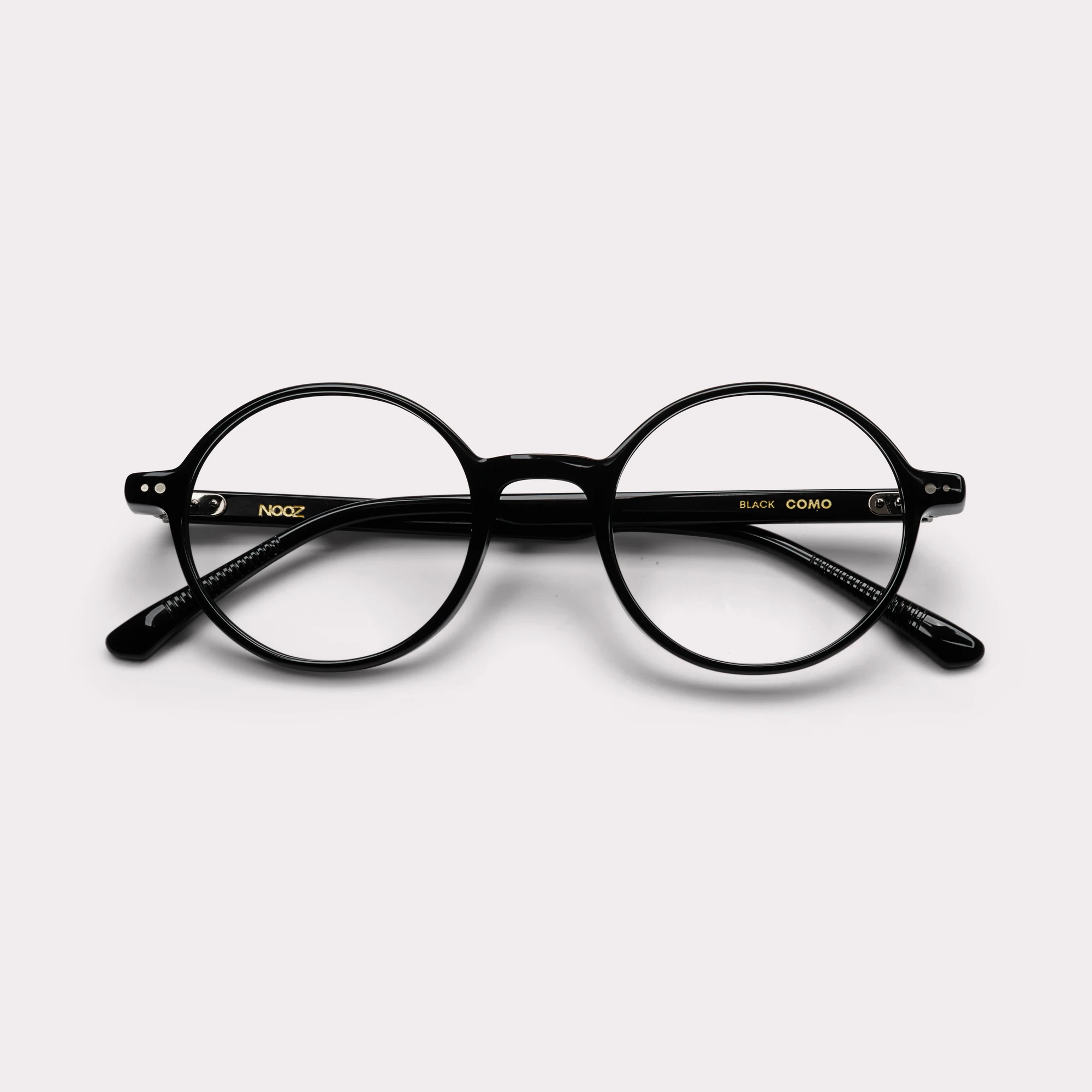Ein Paar Como Schwarz Korrekturbrille , zusammengeklappt