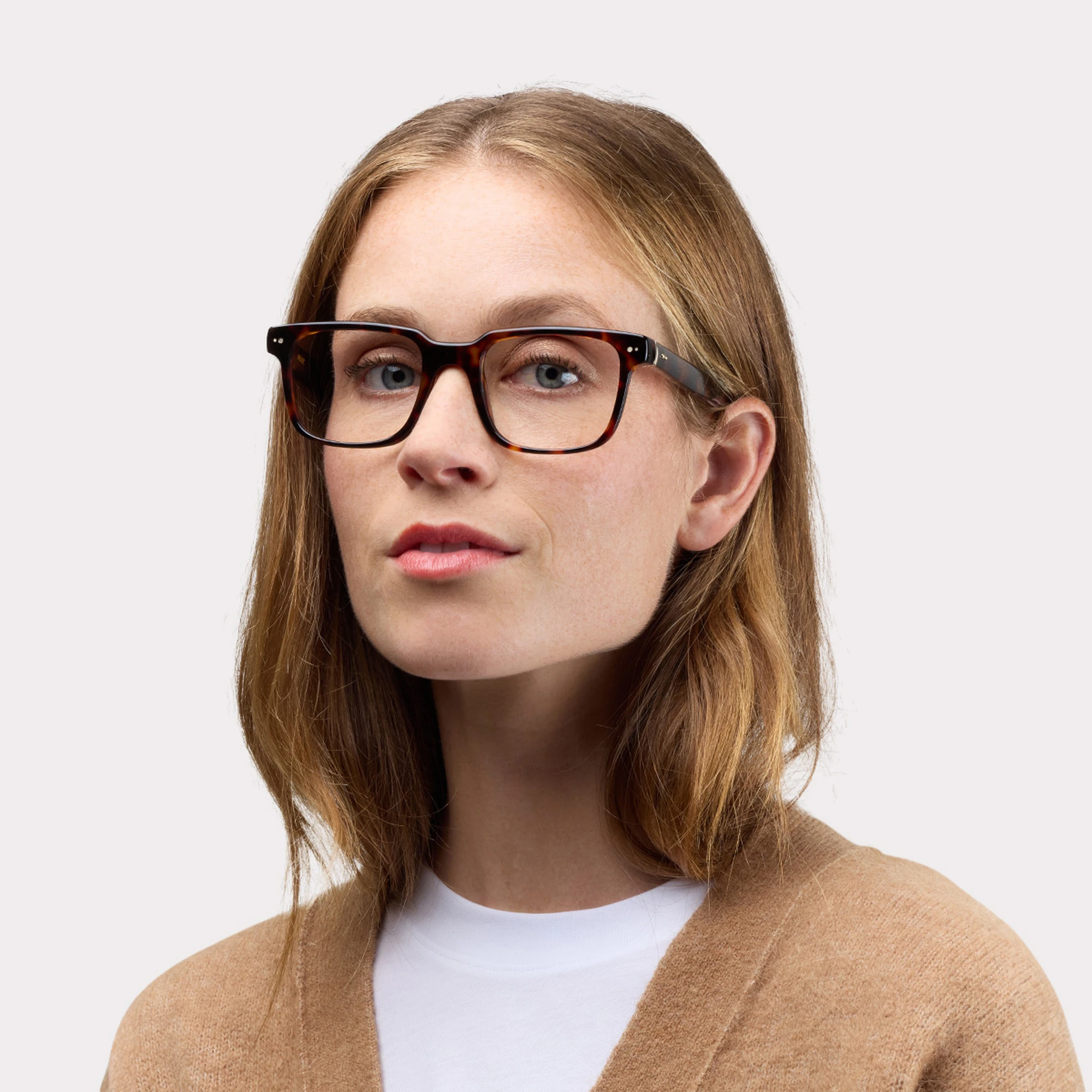 A pair of Roger Tortoise Prescription glasses