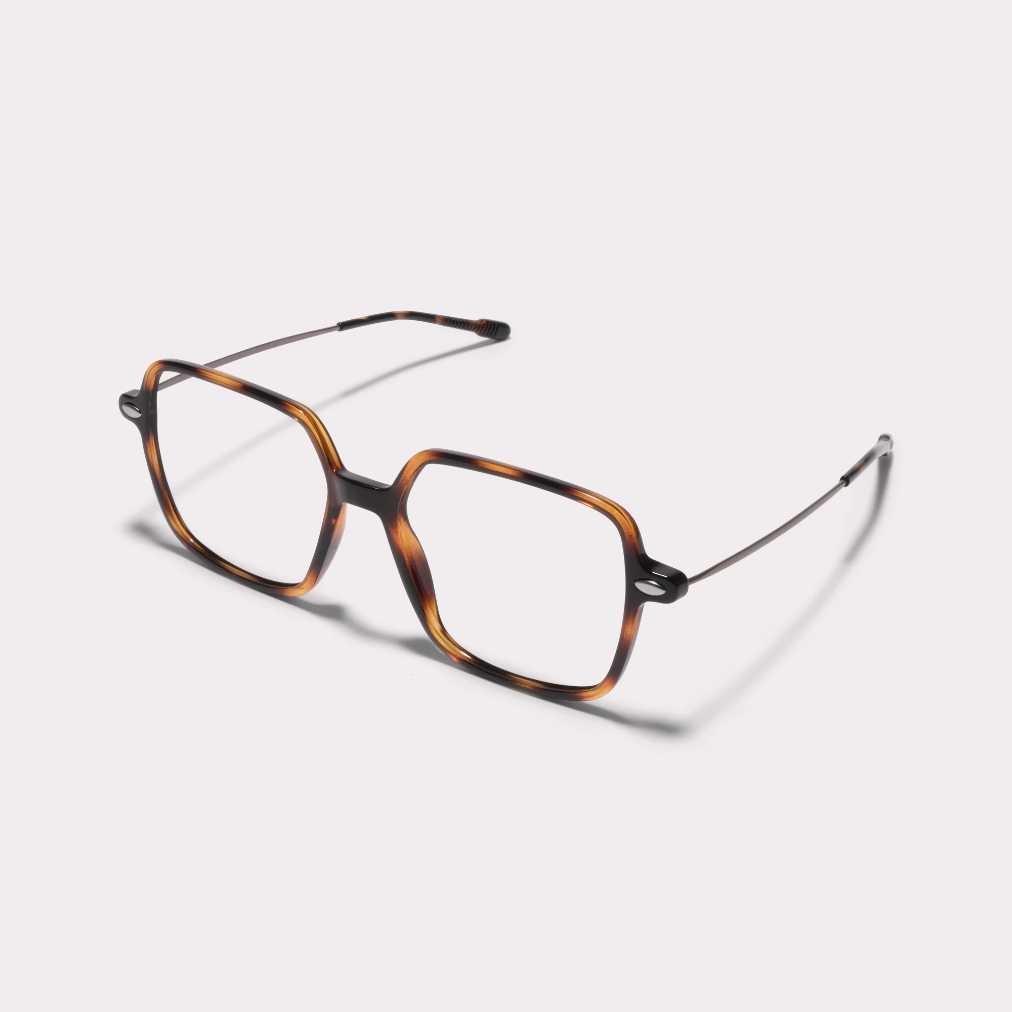 A pair of Lena Tortoise Reading glasses  seen from the side