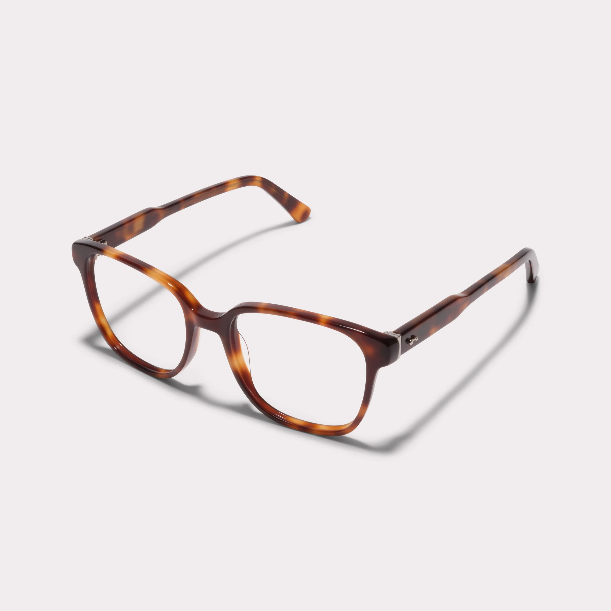 A pair of Clara Tortoise Reading glasses  seen from the side
