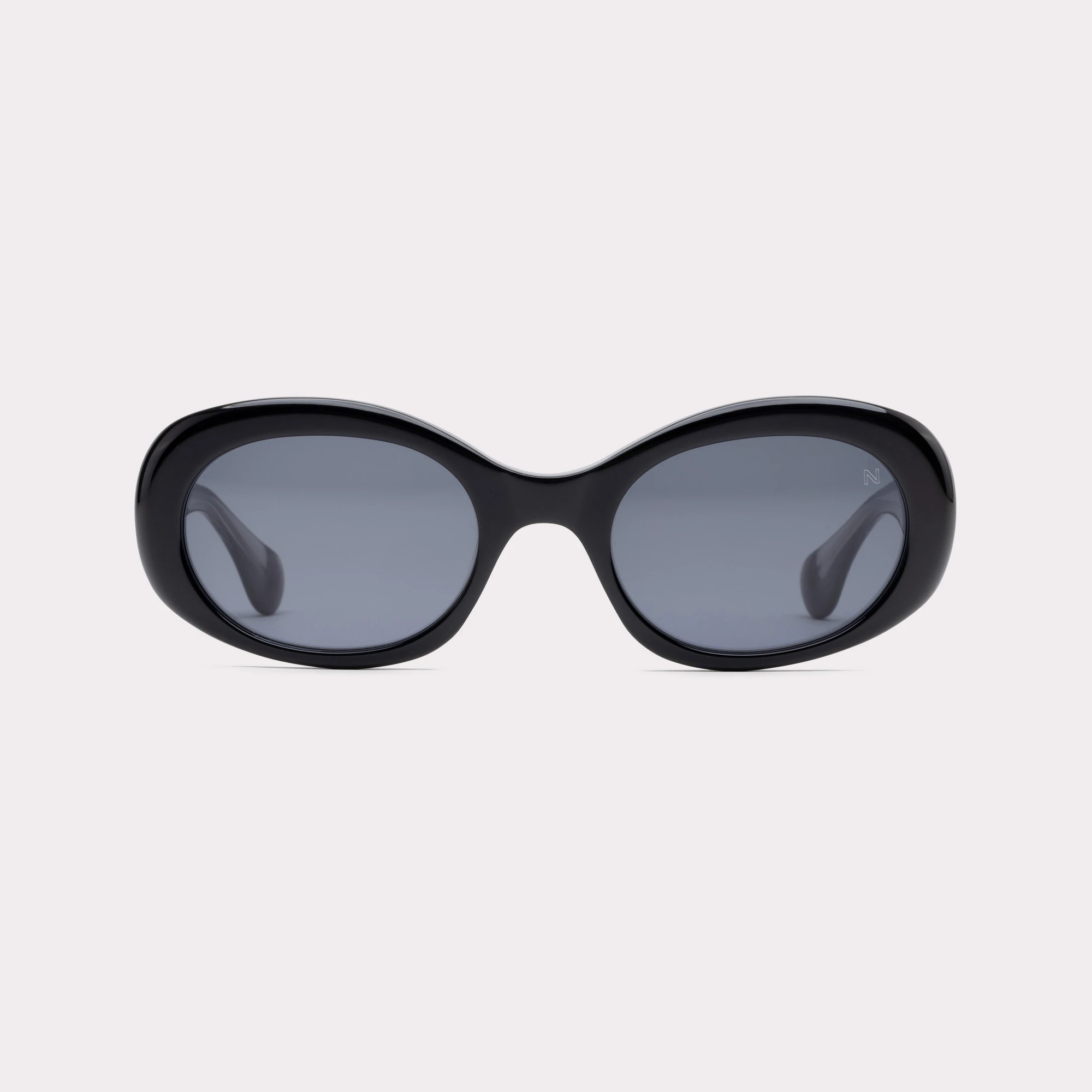 A pair of Loop Black Sunglasses seen from the front