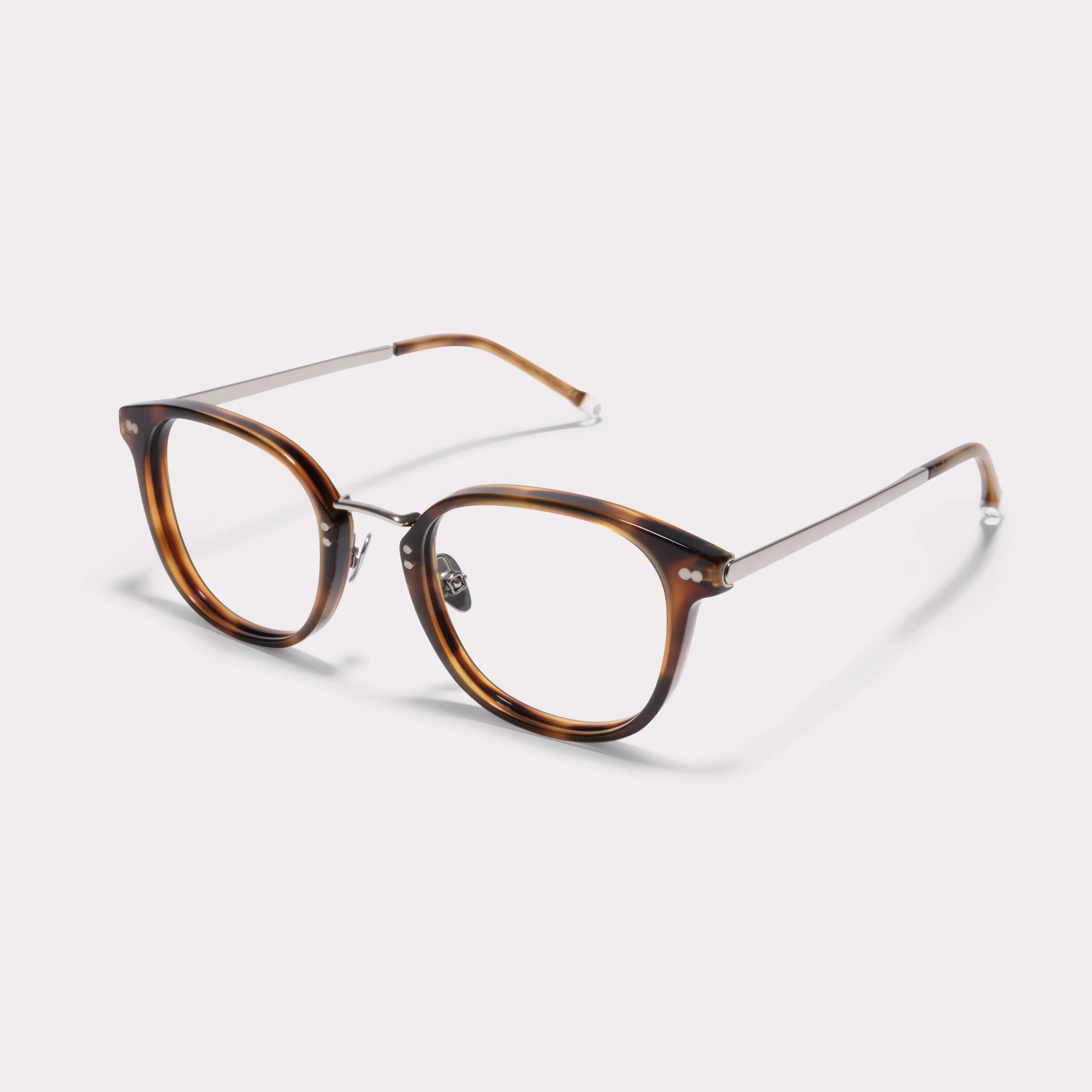 A pair of Covell Tortoise Multi-distance™ blue light blocking reading glasses seen from the side