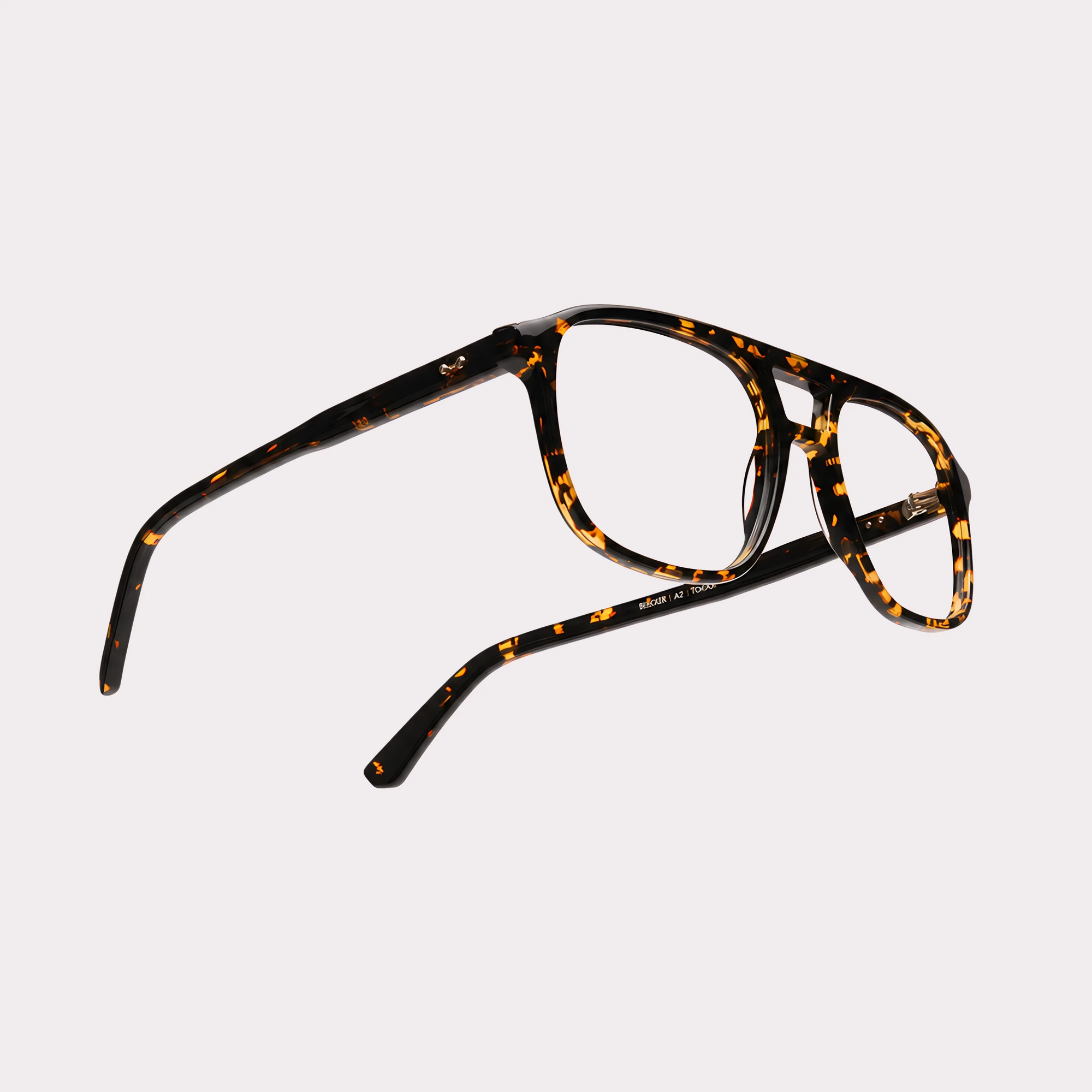 A pair of Milen Yellow tortoise Multi-distance™ blue light blocking reading glasses in a macro view