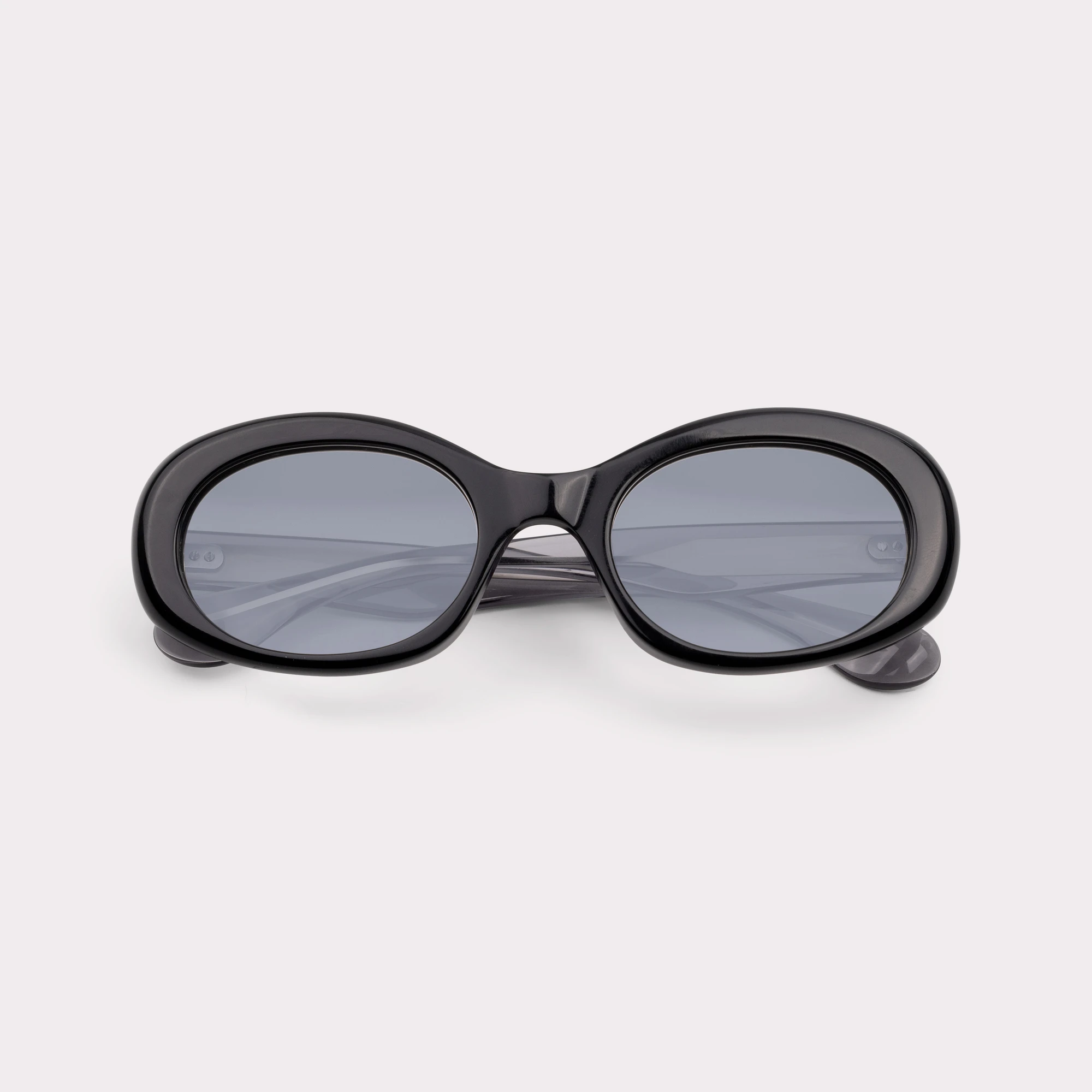 A pair of Loop Black Sunglasses folded