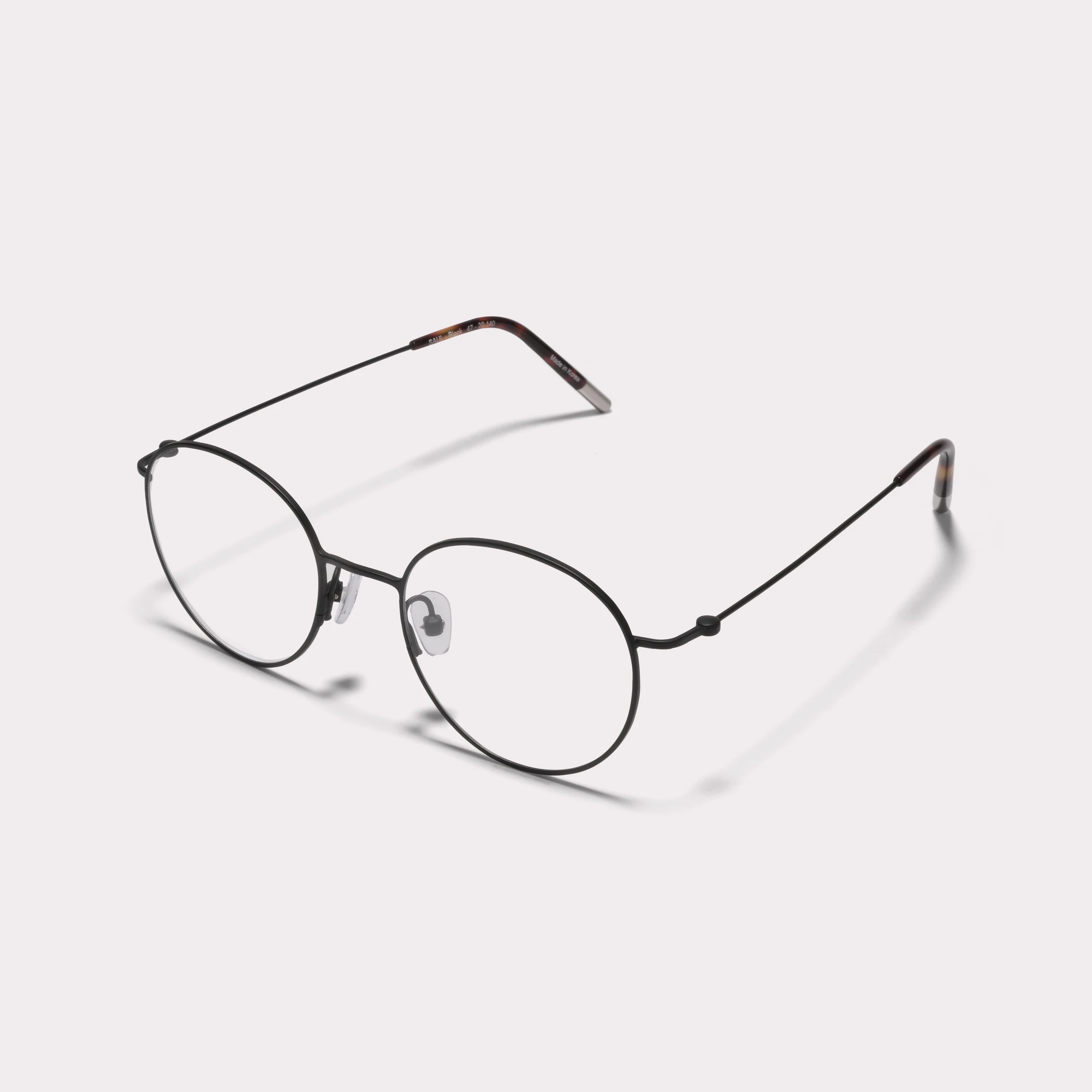 A pair of Saul Black Multi-distance™ blue light blocking reading glasses seen from the side
