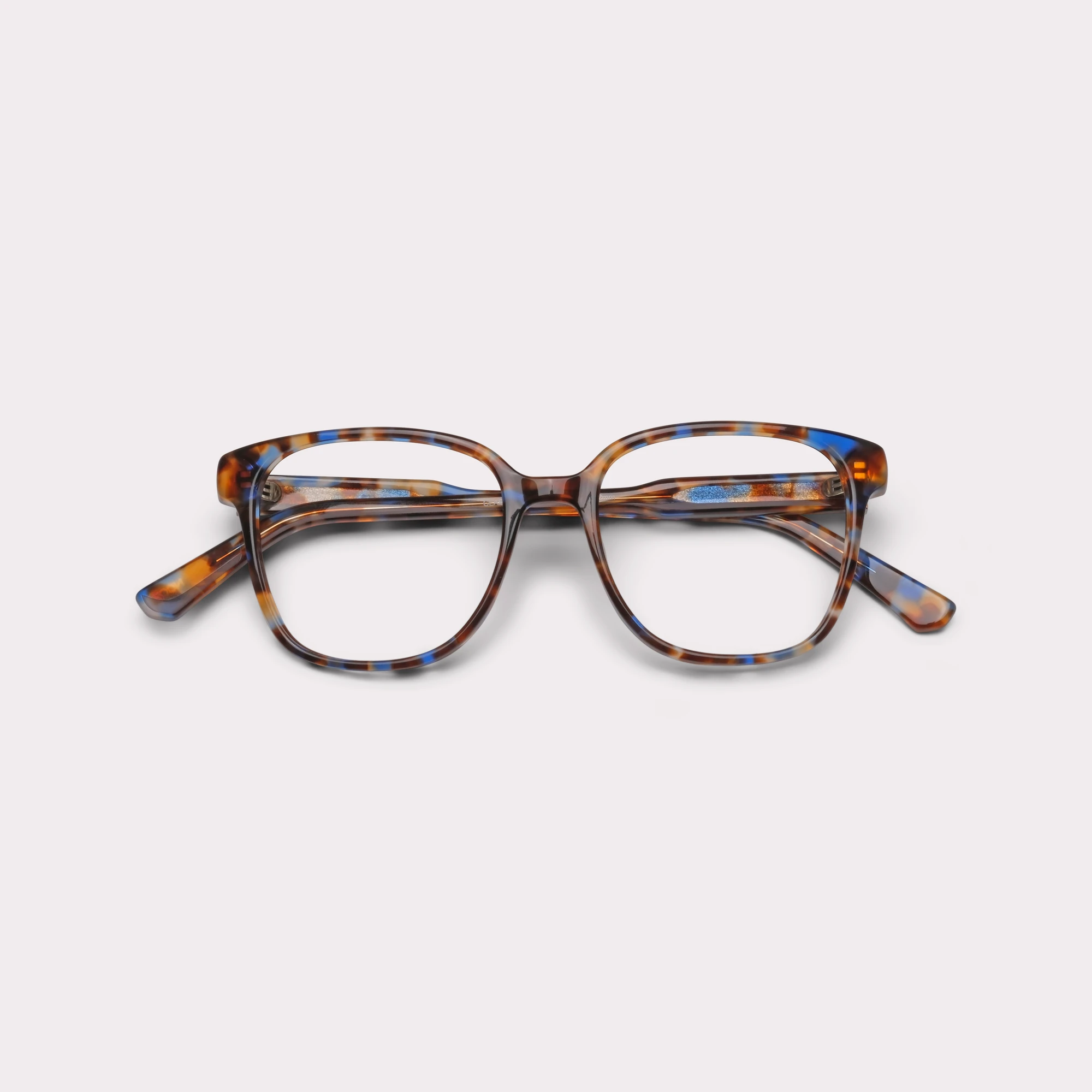 A pair of Clara Blue tortoise Multi-distance™ blue light blocking reading glasses folded