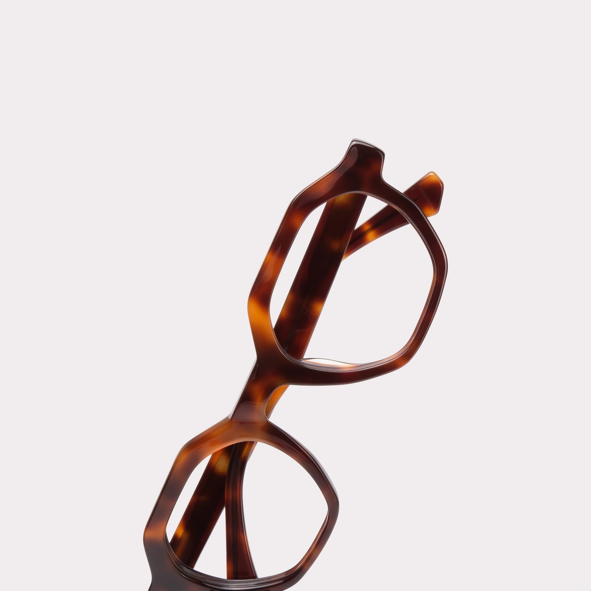 A pair of Miller Tortoise Reading glasses in a macro view