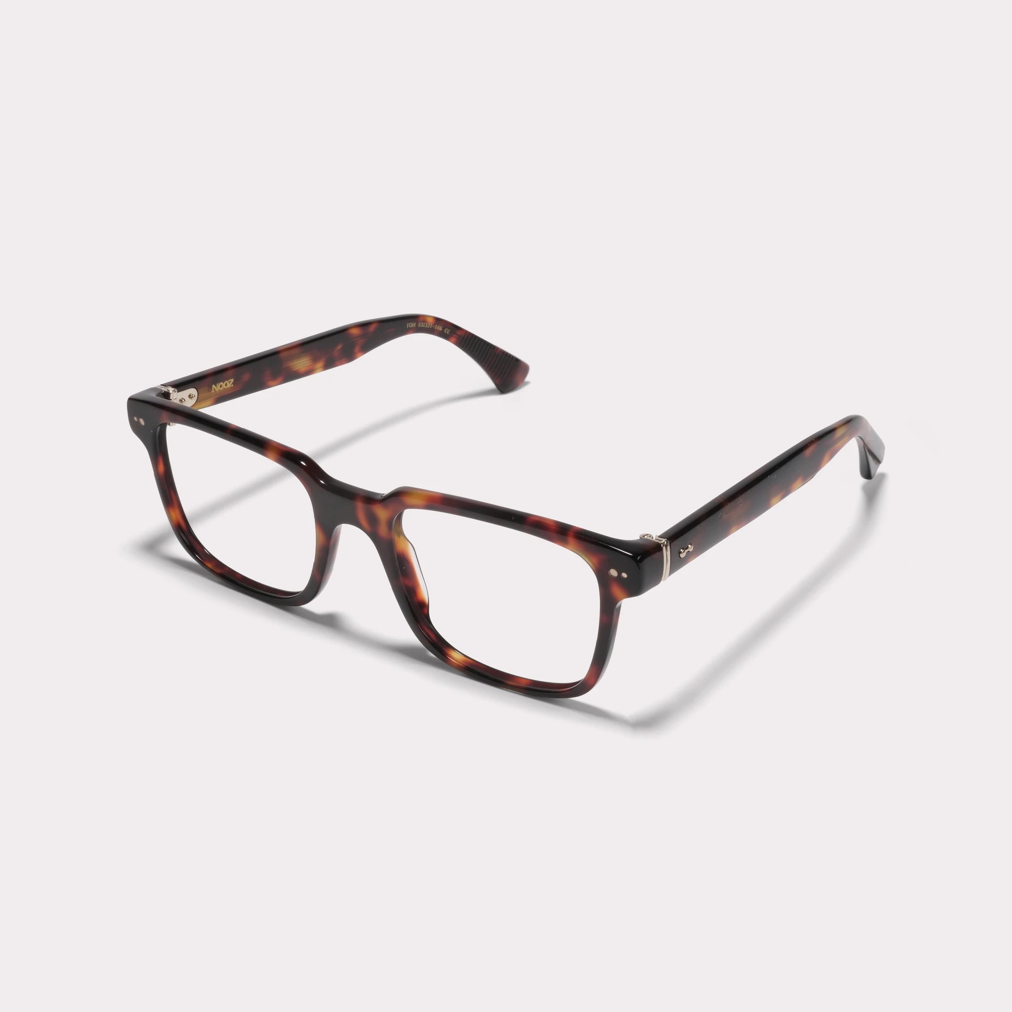 A pair of Roger Tortoise Prescription glasses  seen from the side