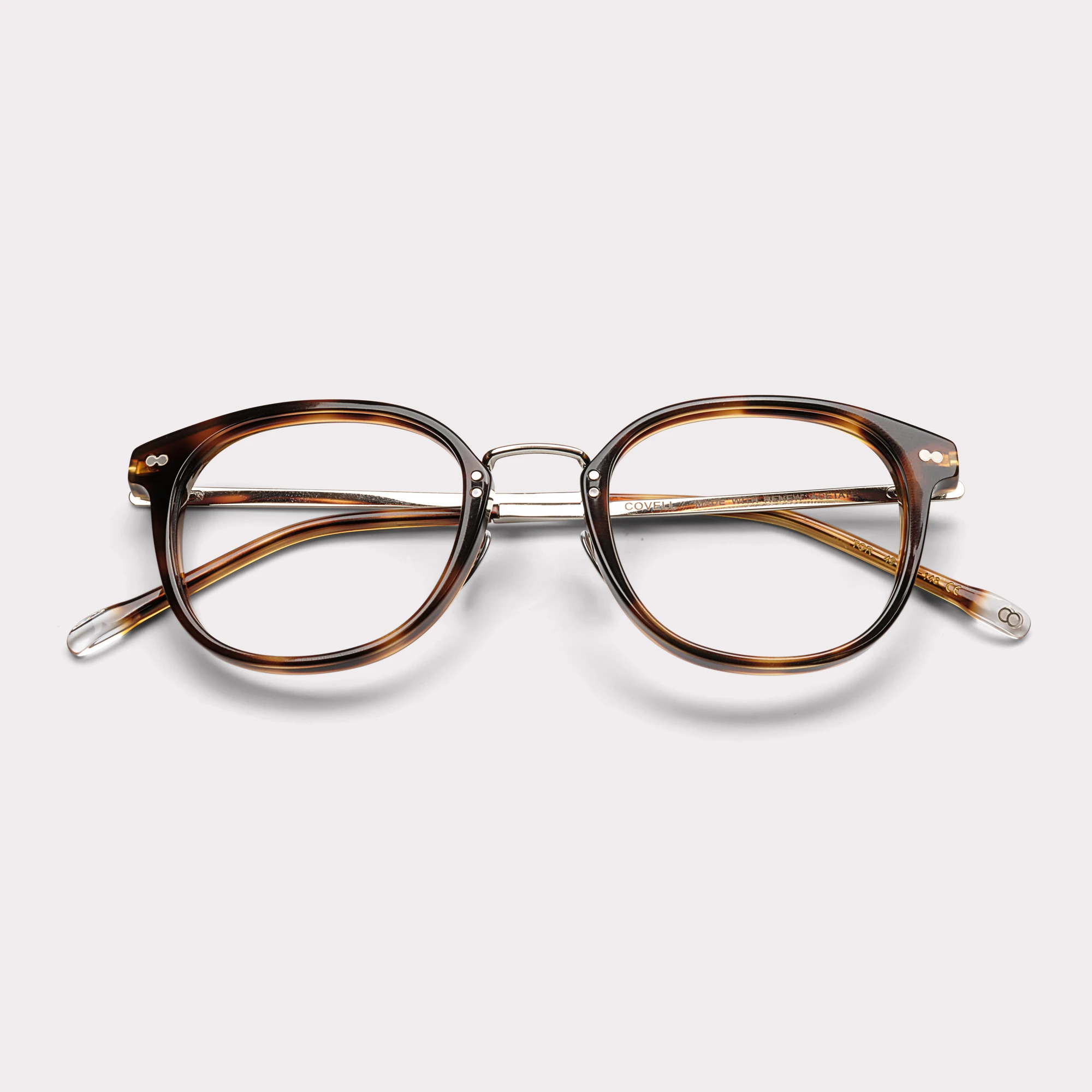 A pair of Covell Tortoise Multi-distance™ blue light blocking reading glasses folded