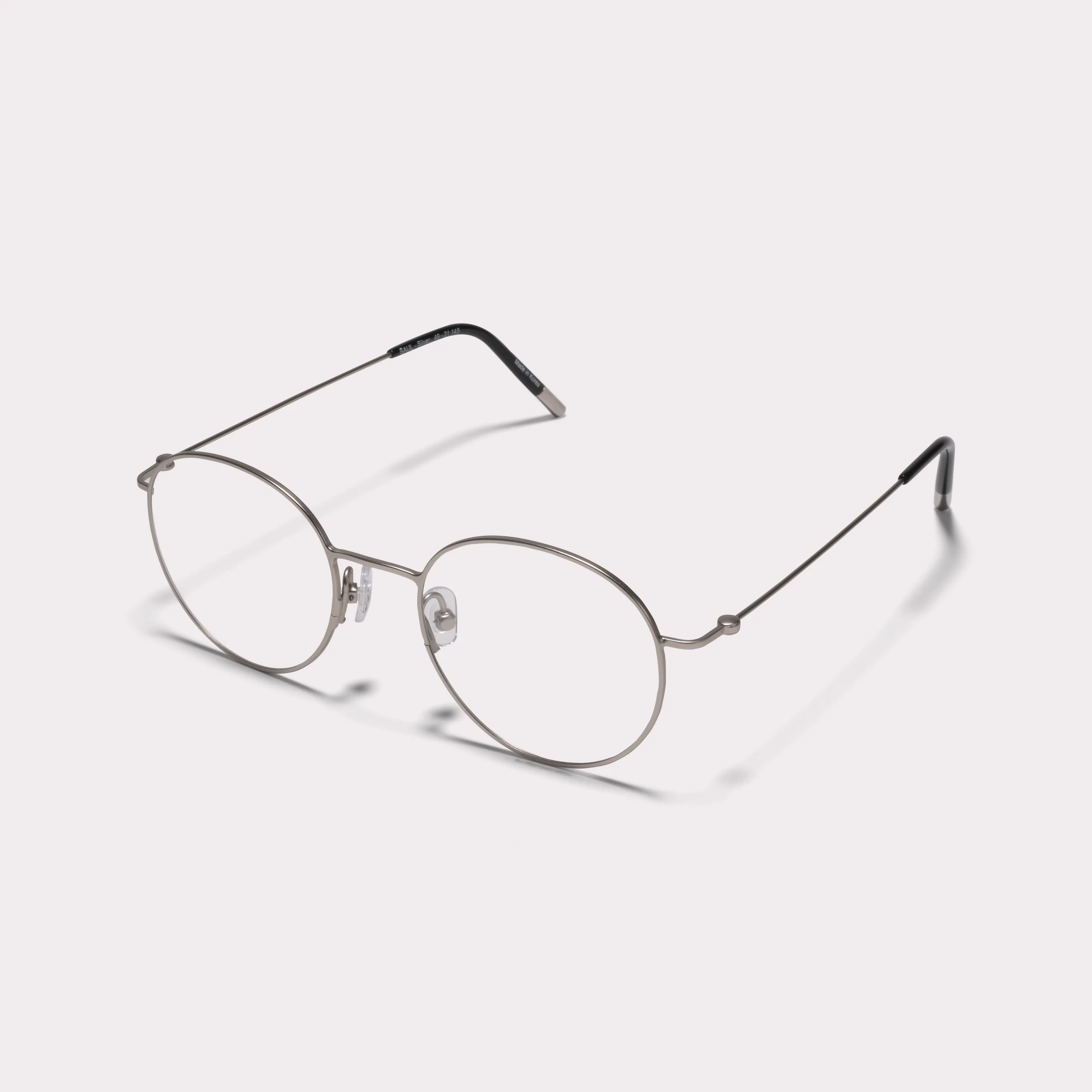 A pair of Saul Silver Prescription glasses  seen from the side