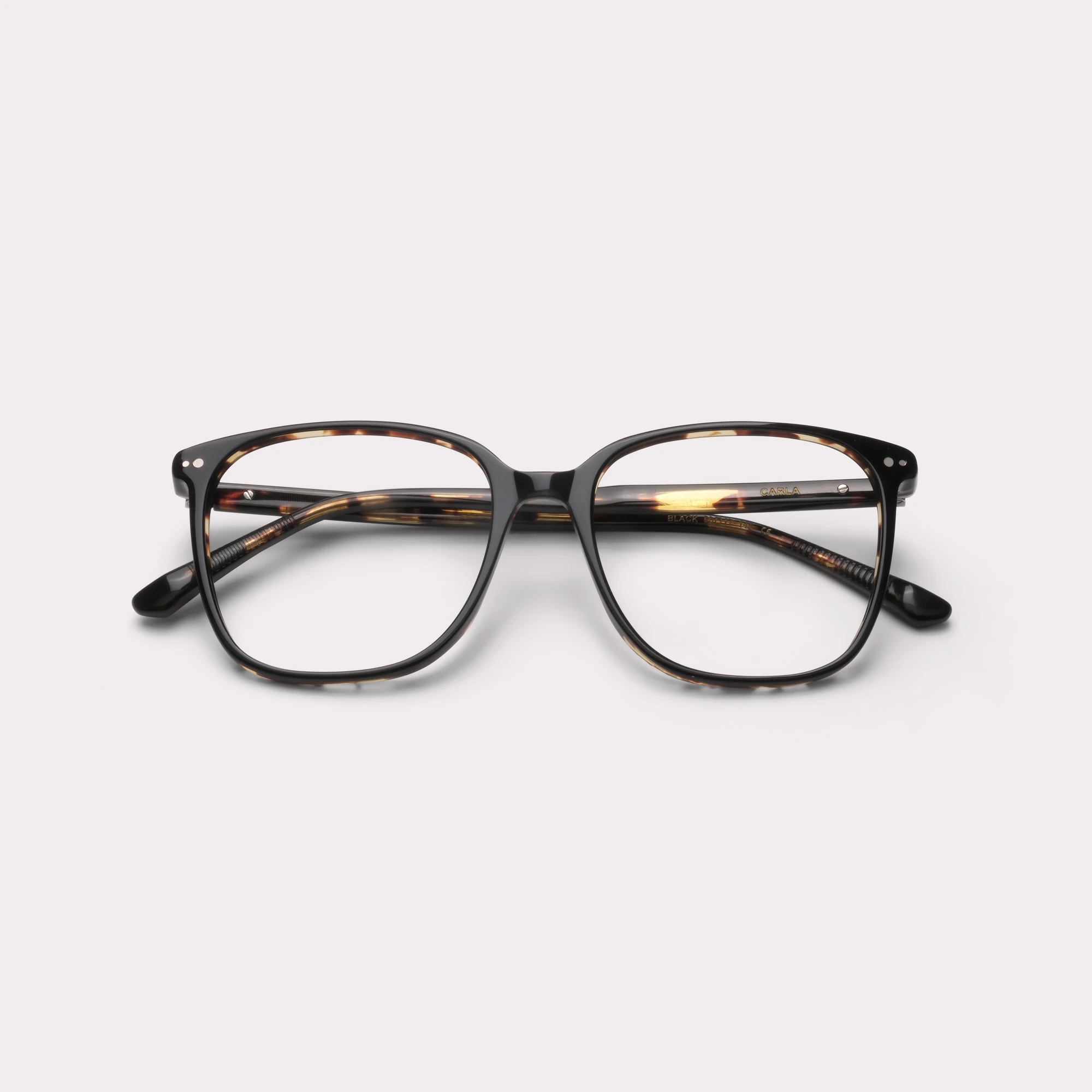 A pair of Carla Black Prescription glasses folded